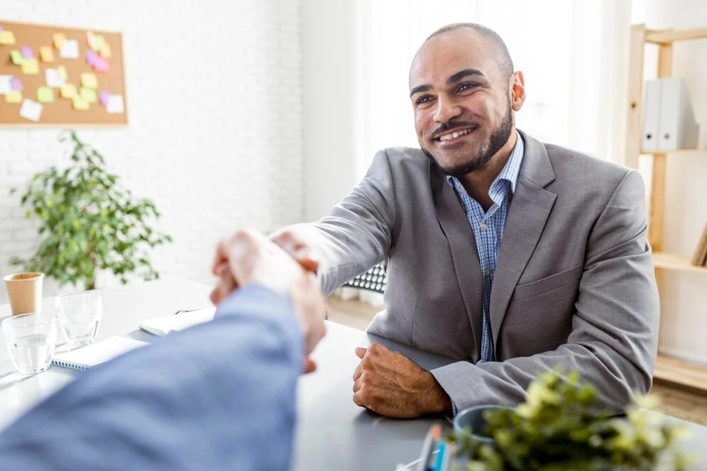 Man shaking hands with someone